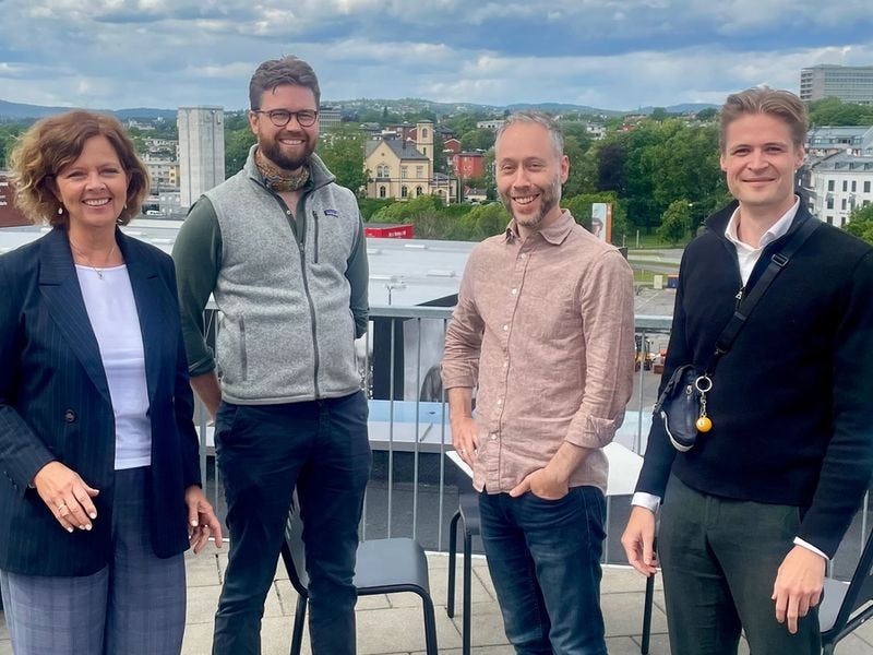 Tone og Peter fra Culture intelligence og Mikkel og Benjamin fra Inmeta på takterrasse